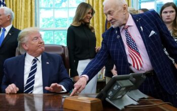 Apollo 11 astronaut Buzz Aldrin (R) talks with U.S. President Donald Trump as they commemorate the 50th anniversary of the moon landing in the Oval Office at the White House July 19, 2019 in Washington, DC.